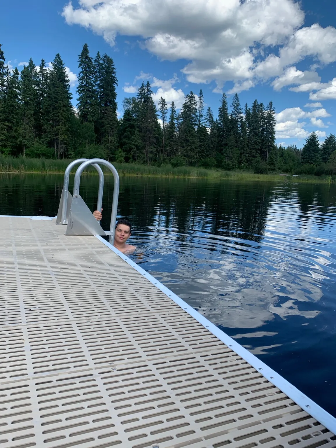 Swimming beside the dock