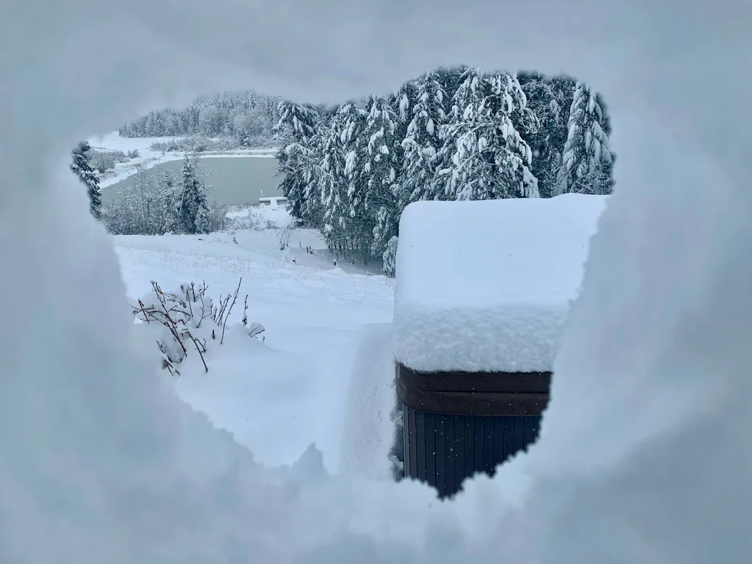 Snow-covered property overlooking the water